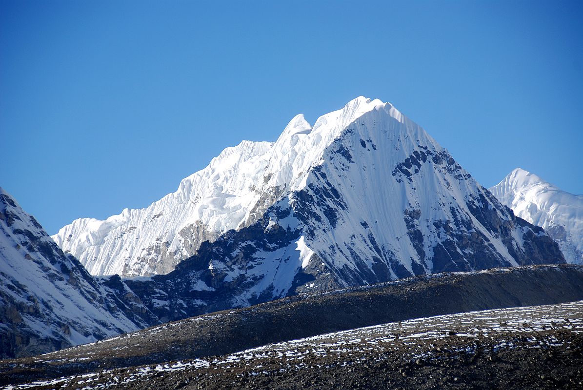 25 Goldum and Langtang Ri Close Up Afternoon From Shishapangma Southwest Advanced Base Camp Goldum (6630m) and Langtang Ri (7239m) close up in the afternoon from Shishapangma Southwest Advanced Base Camp.